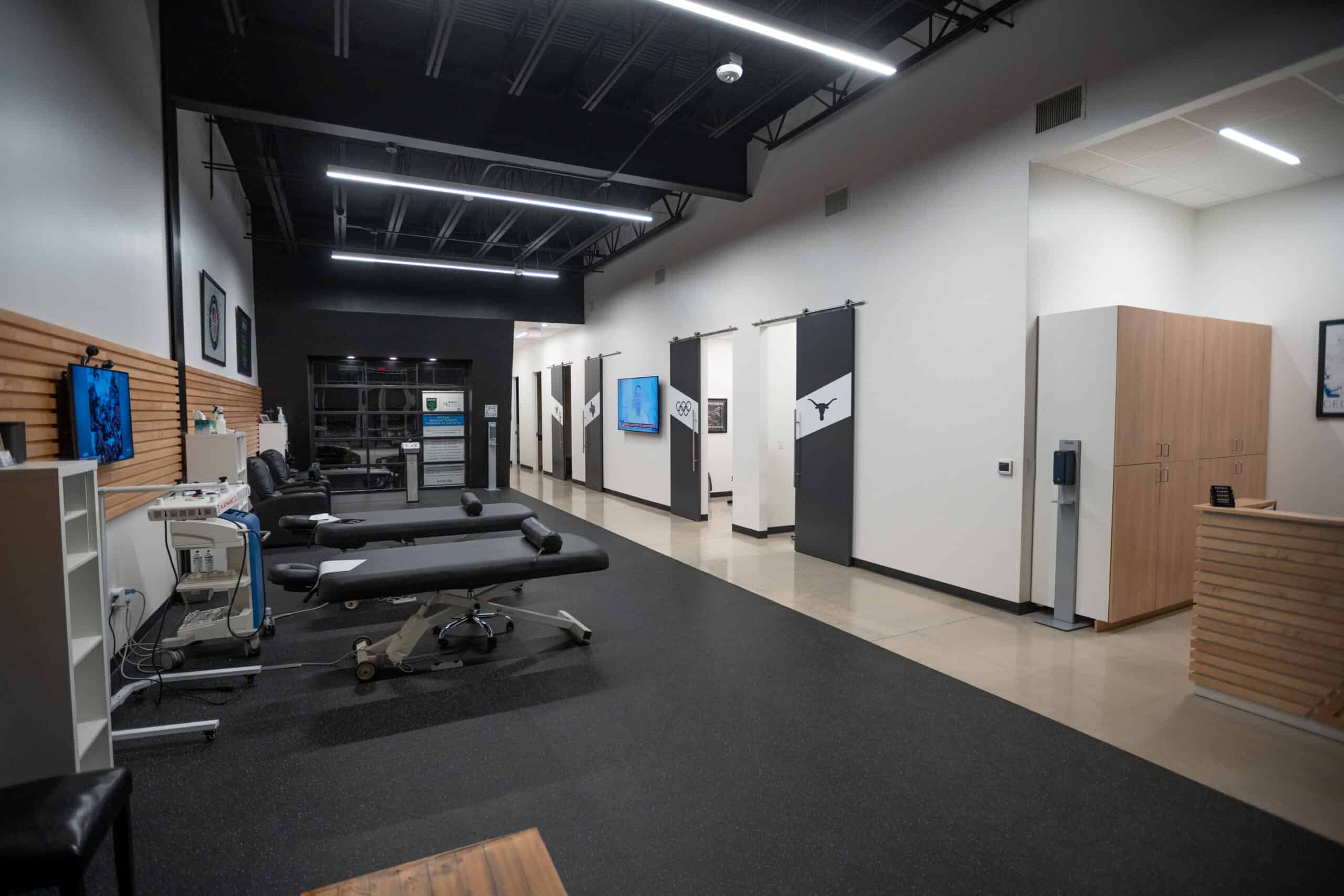 State-of-the-art sports medicine clinic specializing in injury treatment, physical therapy, and athlete rehab with advanced equipment and a modern design.