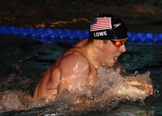Dr. Lowe competing as a USA Swimming athlete — the experience that shaped how he treats today's athletes.