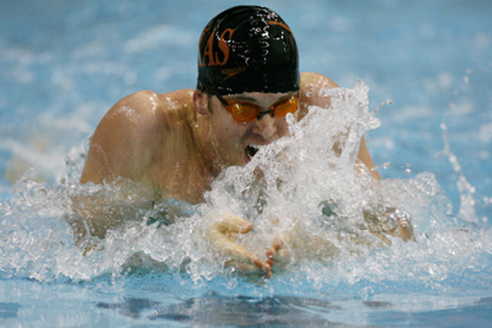 Dr. Lowe's competitive swimming background — the foundation behind his sports medicine career.
