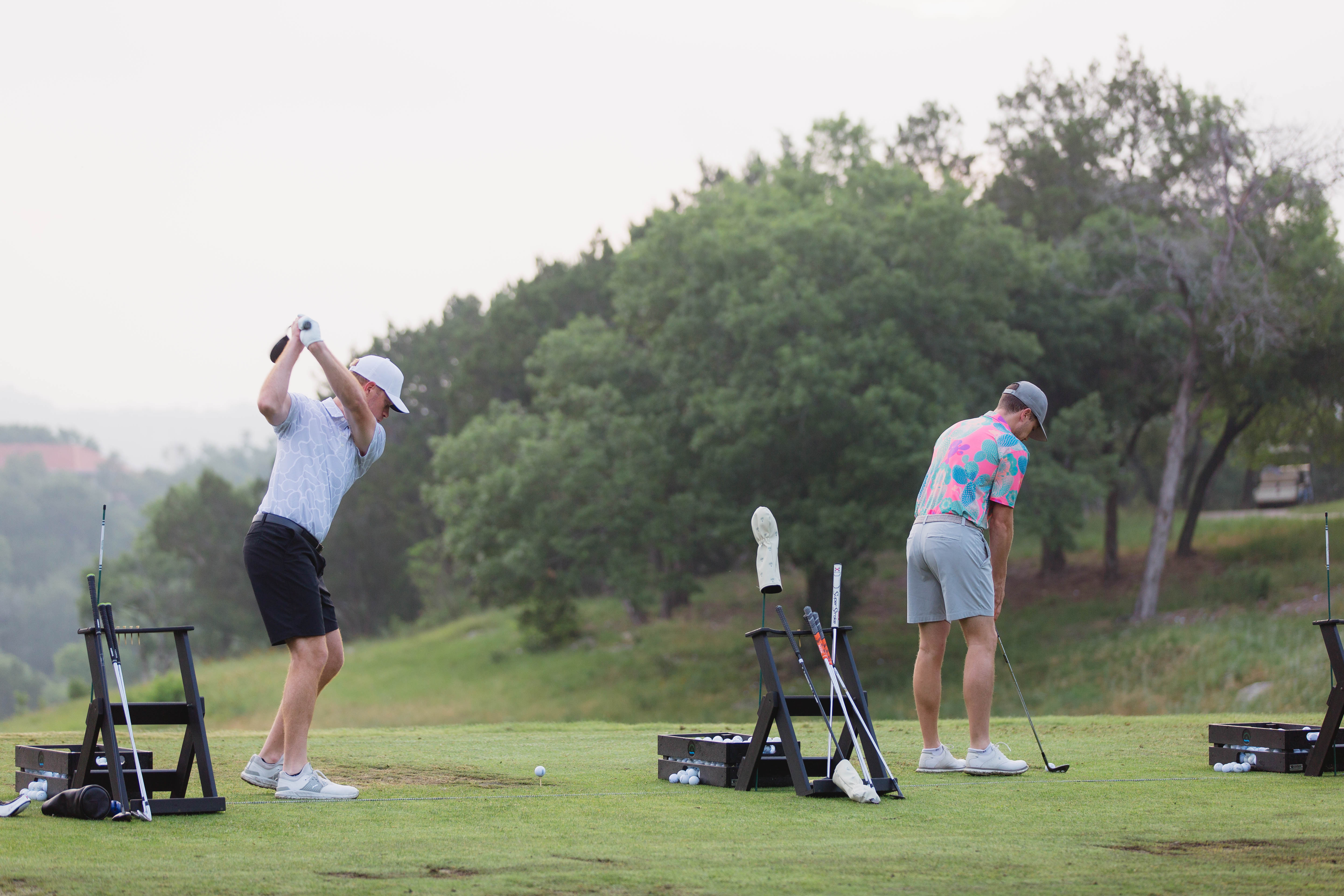Golfers on the range at club event